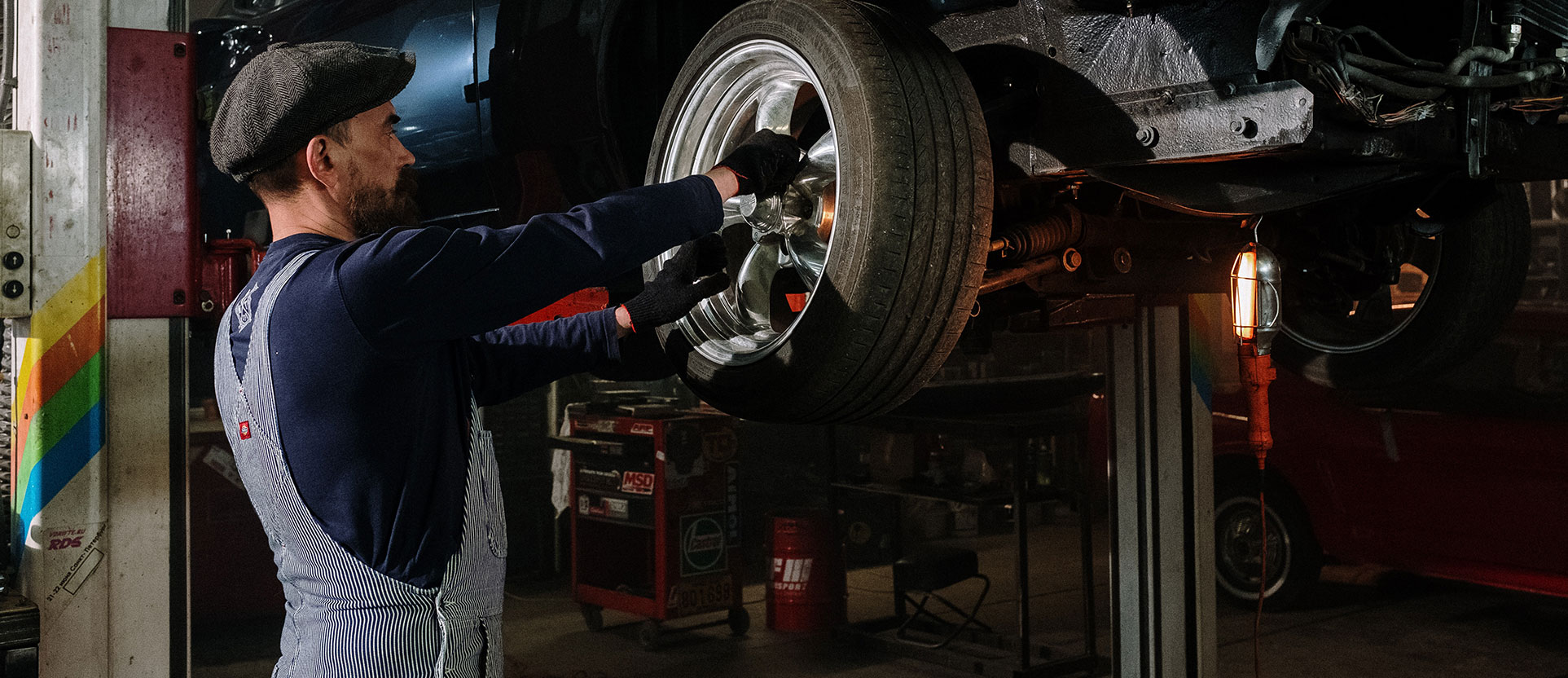 Mechanic Changing a Wheel Mechanic Changing a Wheel